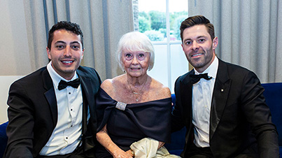Betsy Herold with family friend Craig Rosen (left) and her grandson, Philip Cadorette.